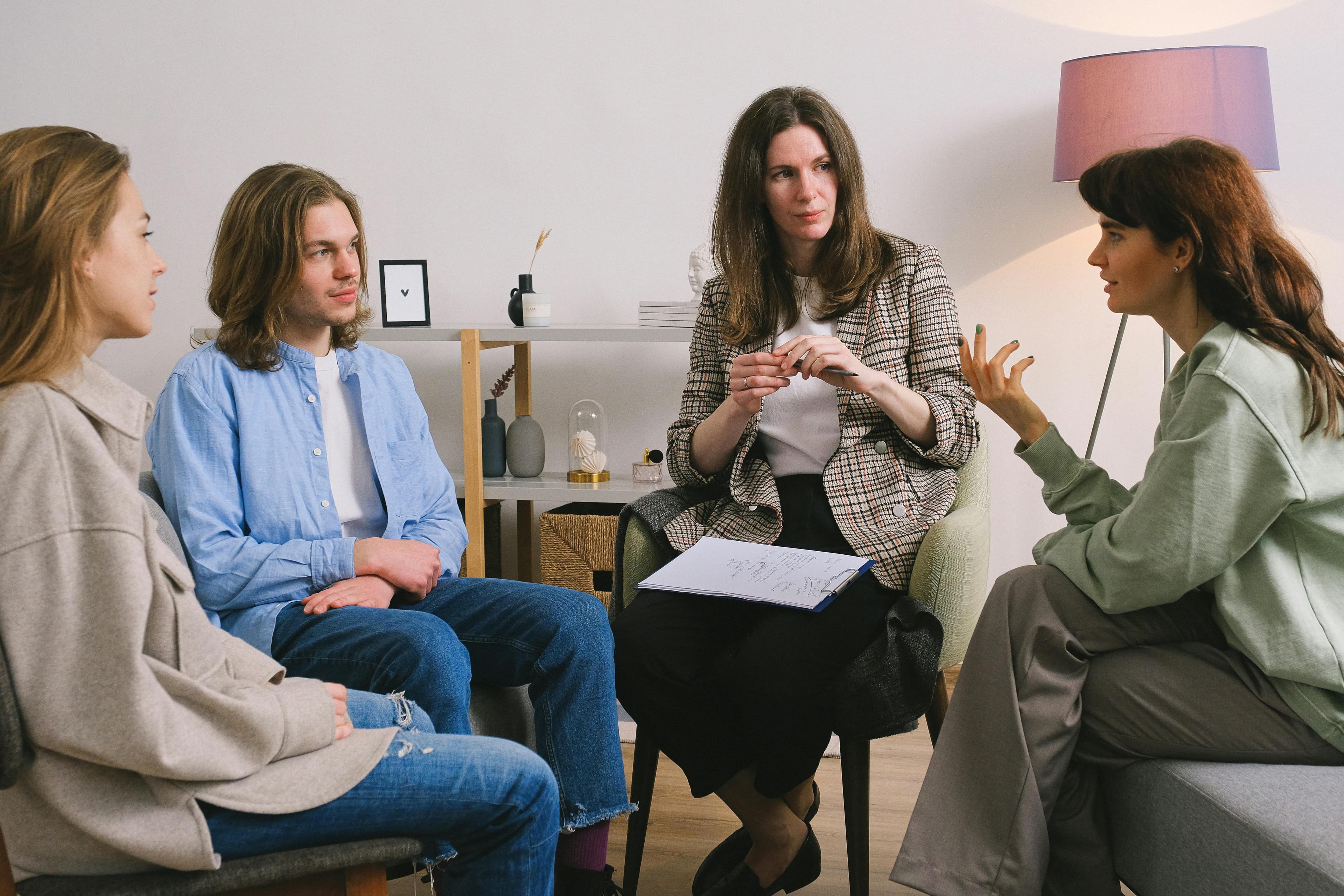 People in a supportive group discussion